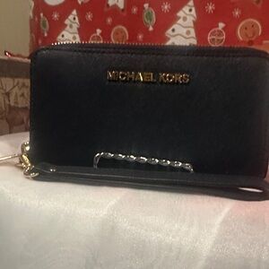 Michael Kors Black Wristlet with Gold Accents